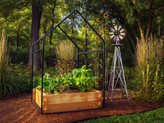 Assembled cedar raised garden bed and greenhouse kit handcrafted by Timberlane Gardens — outdoor cold frame setup.